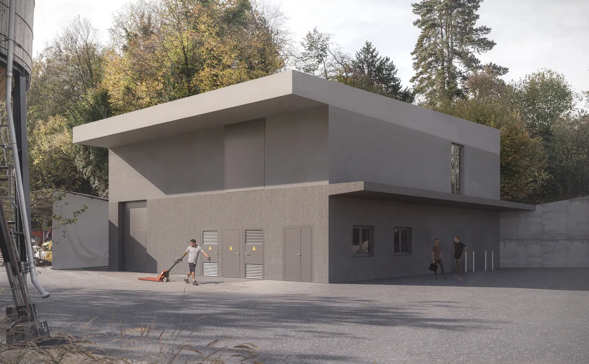 So soll die Energiezentrale nach der Fertigstellung aussehen. Rund 150 Liegenschaften wird sie mit Fernwärme versorgen. Ein graues Betongebäude, in dem Fernwärmeenergie entsteht.